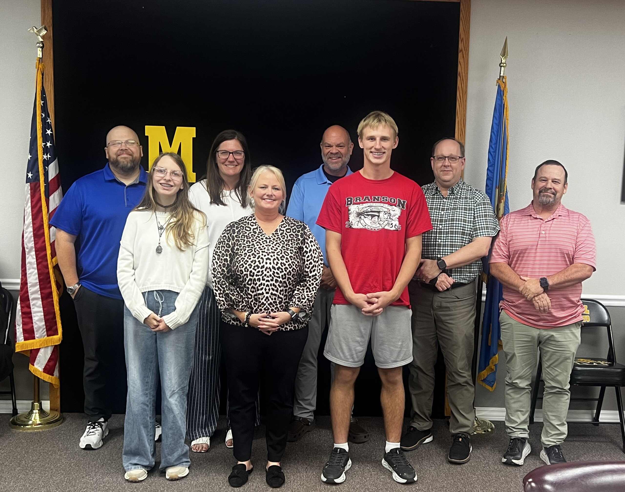 High School Students of the month with board members